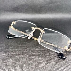 Cartier Gold Rimless Glasses with Red Case